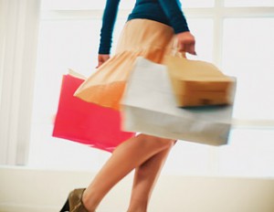 Woman With Shopping Bags Wearing High Heels