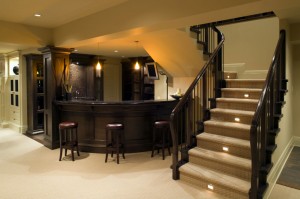 Renovated modern basement with bar and carpet (Getty Images/Kevin Miller)