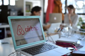 A picture shows the logo of online lodging service Airbnb displayed on a computer screen in the Airbnb offices in Paris on April 21, 2015. AFP PHOTO / MARTIN BUREAU (Photo credit should read MARTIN BUREAU/AFP/Getty Images)