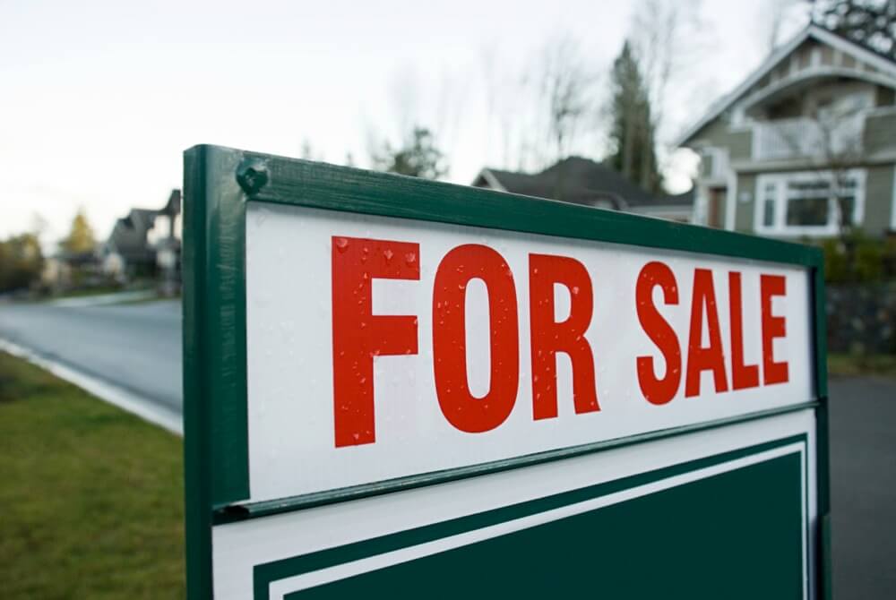 Buying property through tax sales (Getty Images / Image Source)