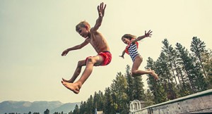 kids jumping off dock cottage season