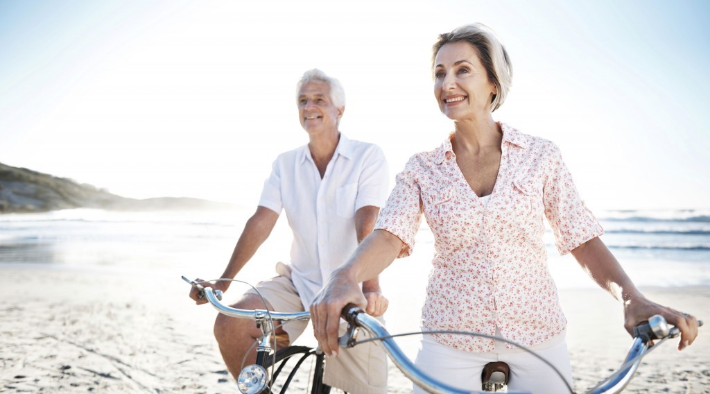 Couple-happy-retirement-beach-1024x568