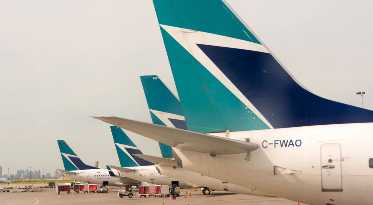 TORONTO, ONTARIO, CANADA - 2014/06/23: Westjet plane tails in Pearson International Airport. Westjet is an economical Canadian Airline serving mostly tourist destinations. (Photo by Roberto Machado Noa/LightRocket via Getty Images)