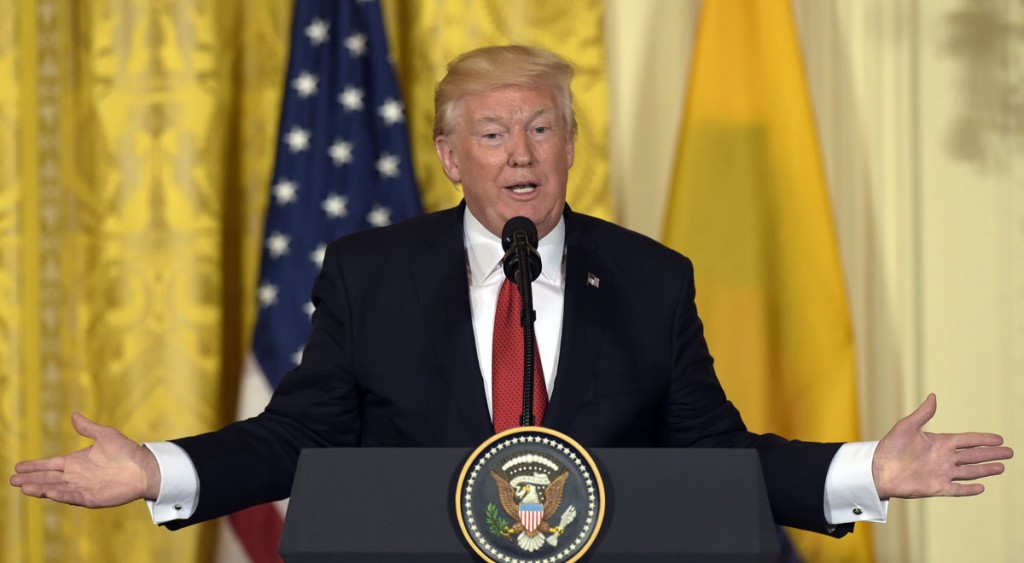 FILE - In this May 18, 2017 file photo, President Donald Trump speaks in the East Room of the White House in Washington. Trump’s attorneys originally wanted him to submit an updated financial disclosure without certifying the information as true, according to correspondence with the Office of Government Ethics. (AP Photo/Susan Walsh, File)