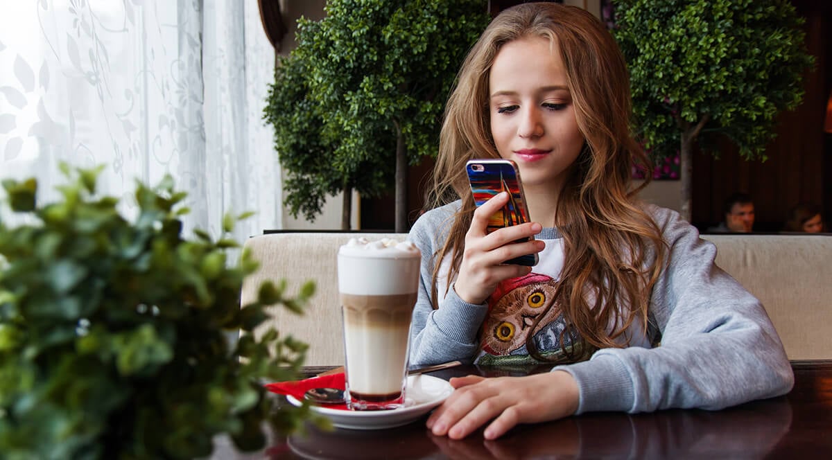 young woman drinking coffee-1200