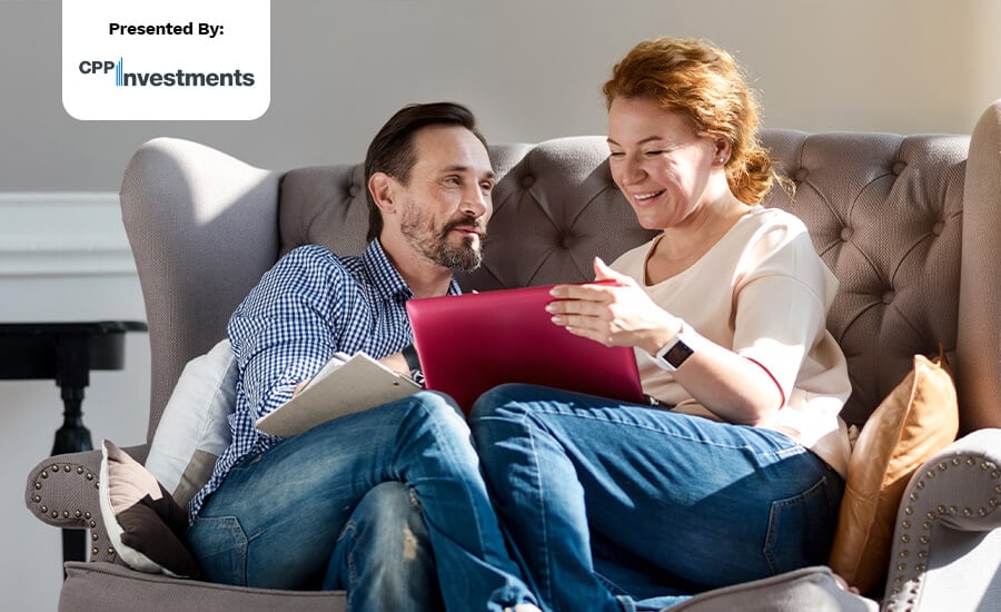 Couple discussing investments over their tablet