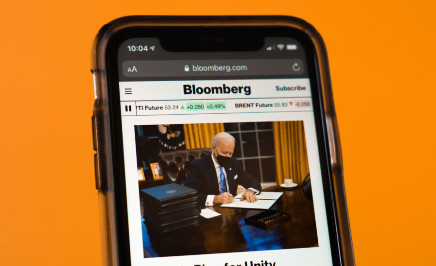 A cellphone with a Joe Biden article.