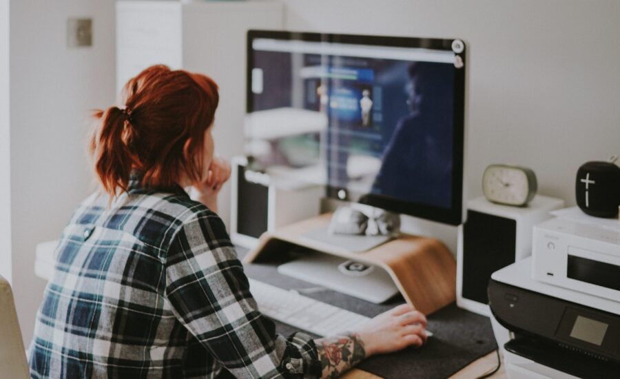 Woman working at desktop computer