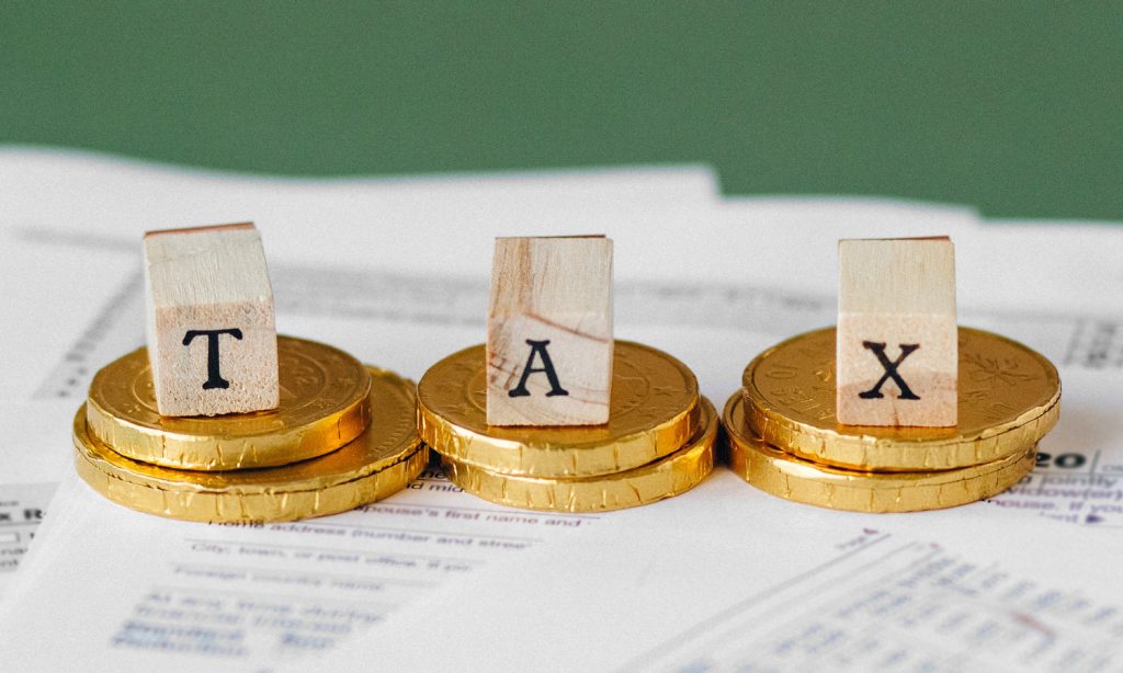 Tax spelled out with wooden blocks