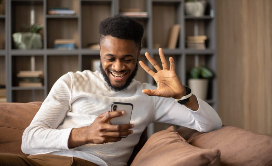 man FaceTiming on cellephone