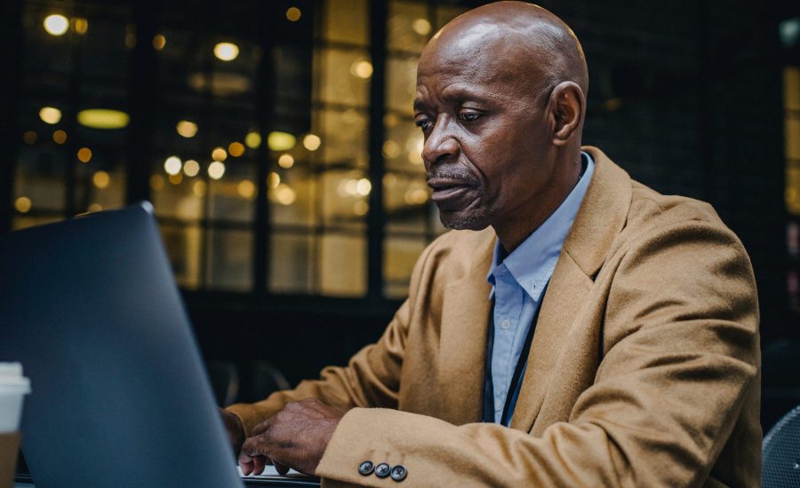 older man at laptop computer