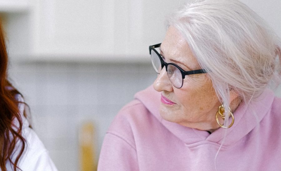 white-haired woman in her kitchen