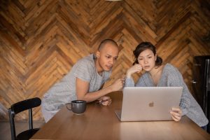 couple looking at laptop screen