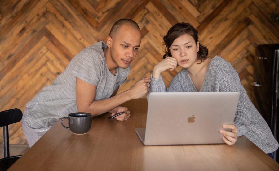 couple looking at laptop screen