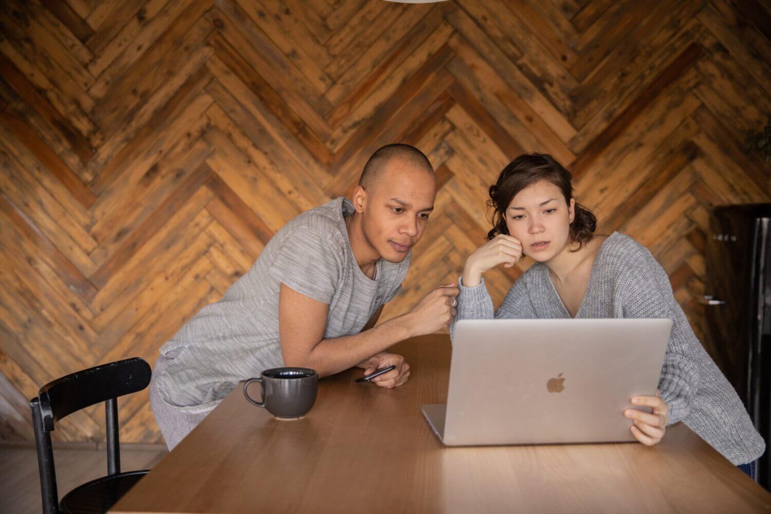 couple looking at laptop screen