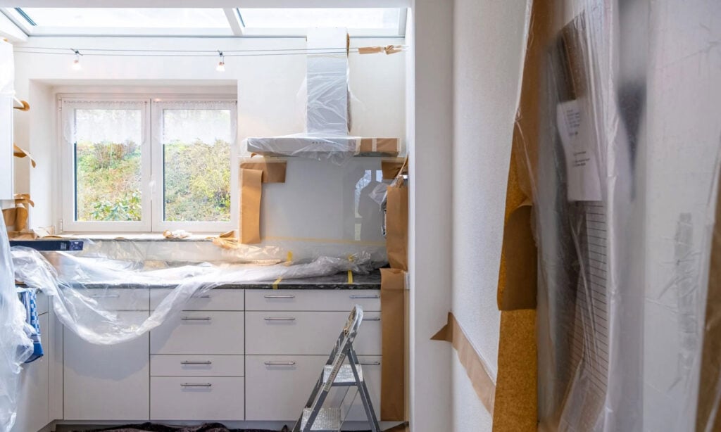 A freshly renovated kitchen with slick new cupboards and new applianes.