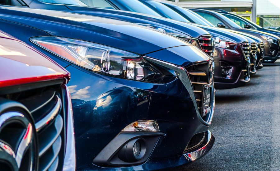 cars lined up on a sales lot