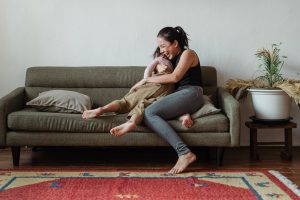 young family on couch