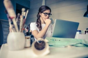 woman frowning in home office