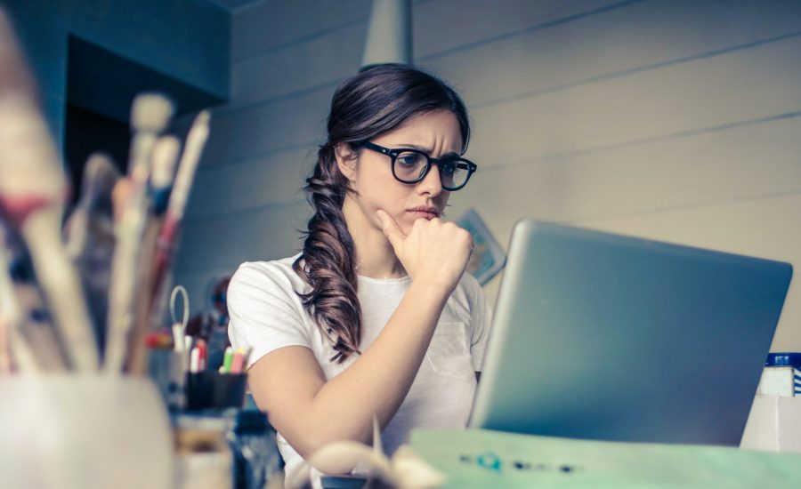 woman frowning in home office