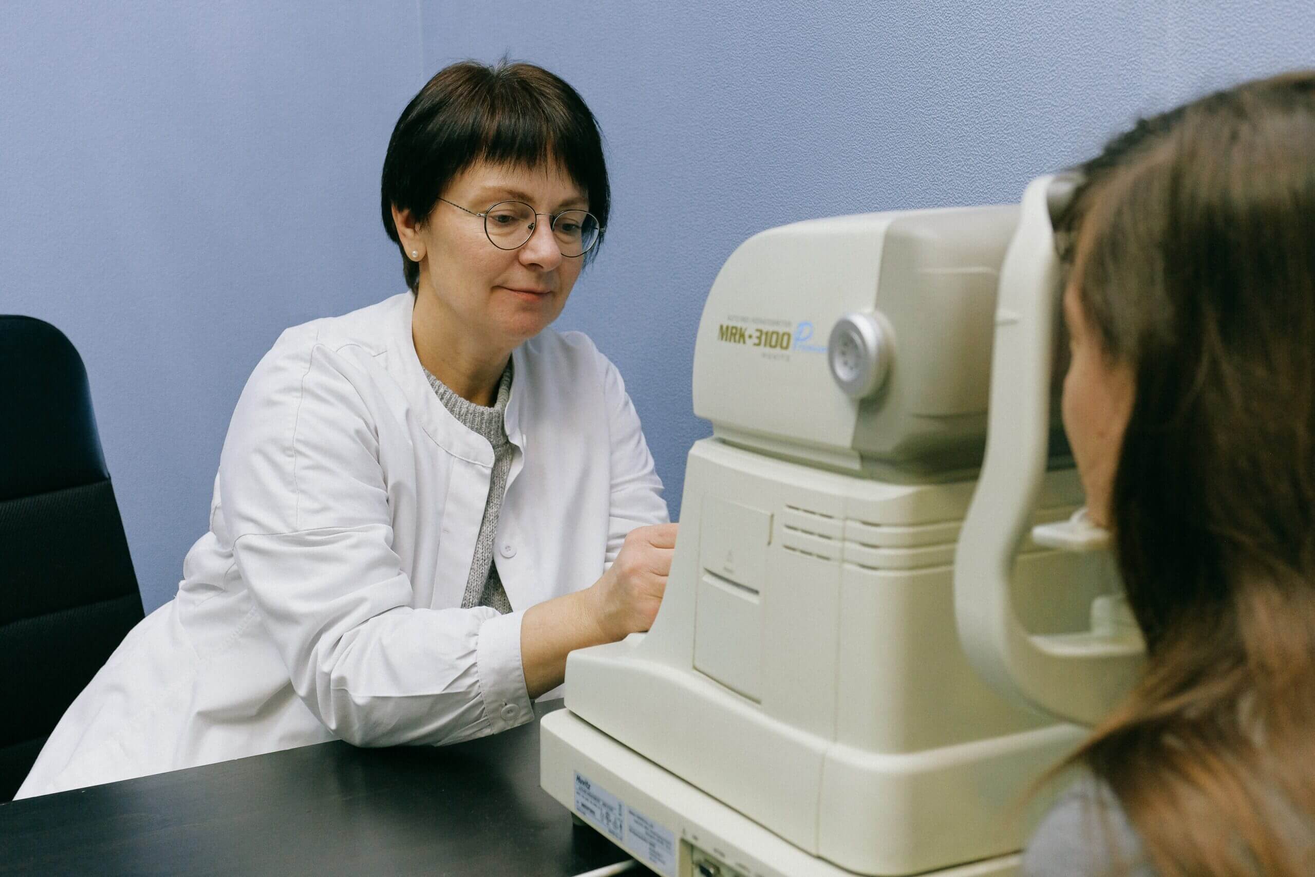 woman optometrist with patient