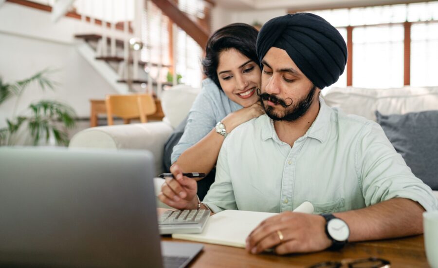 couple looking at laptop monitor