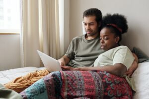 couple at home reading insurance myths