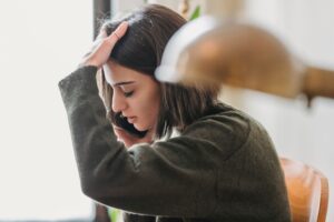 young woman having phone conversation