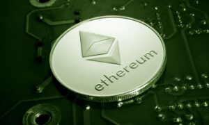 Close-up photo of a coin with ethereum's name and logo.