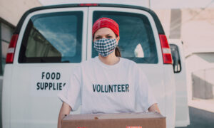 A woman volunteering for a charity