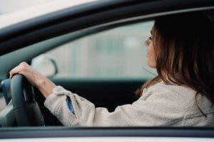 young-woman-driving-car