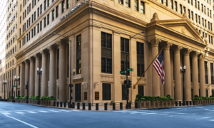 An image of a building on street corner is displayed