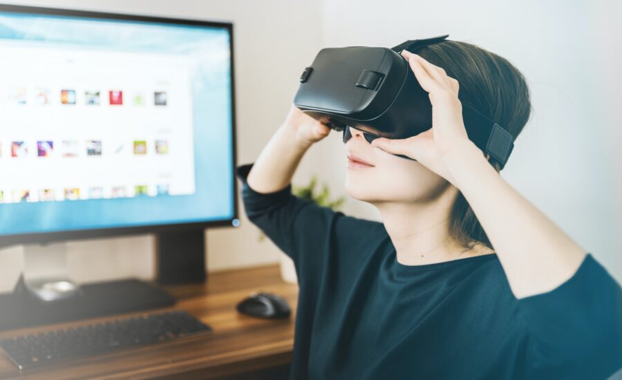 A woman wearing a pair of virtual reality goggles