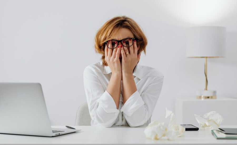 A woman stresses over an important financial decision