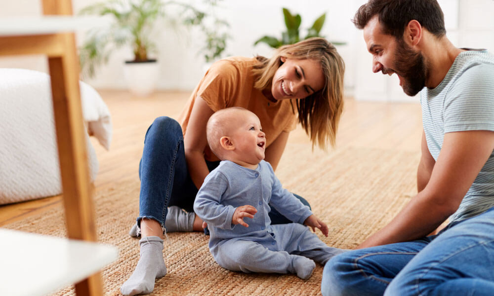 young family with baby on the floor