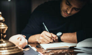 A man reviews documents following a change in the Bank of Canada's overnight rate