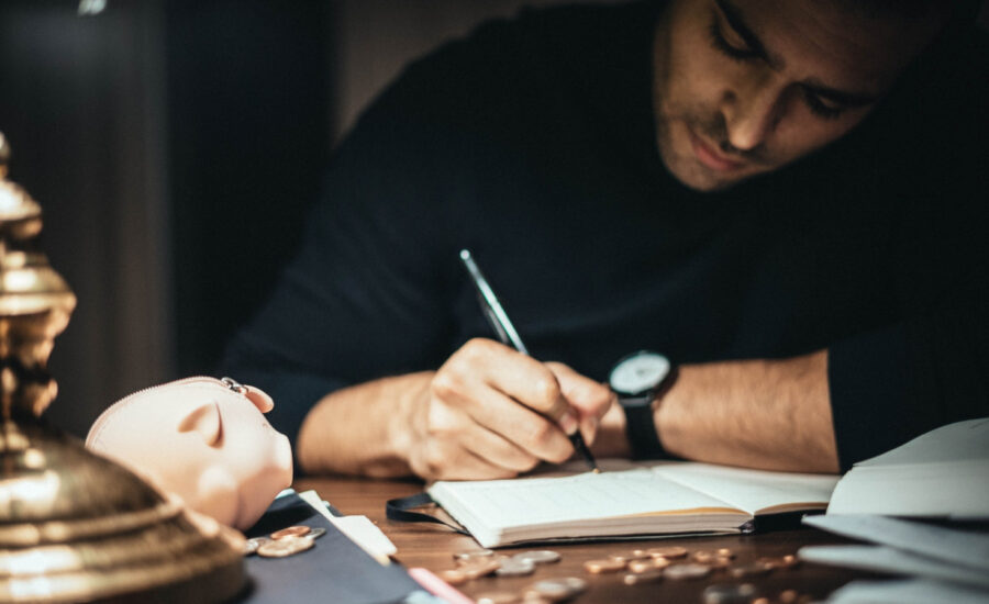 A man reviews documents following a change in the Bank of Canada's overnight rate