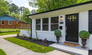 The exterior view of a bungalow that will serve as the buyer's vacation home