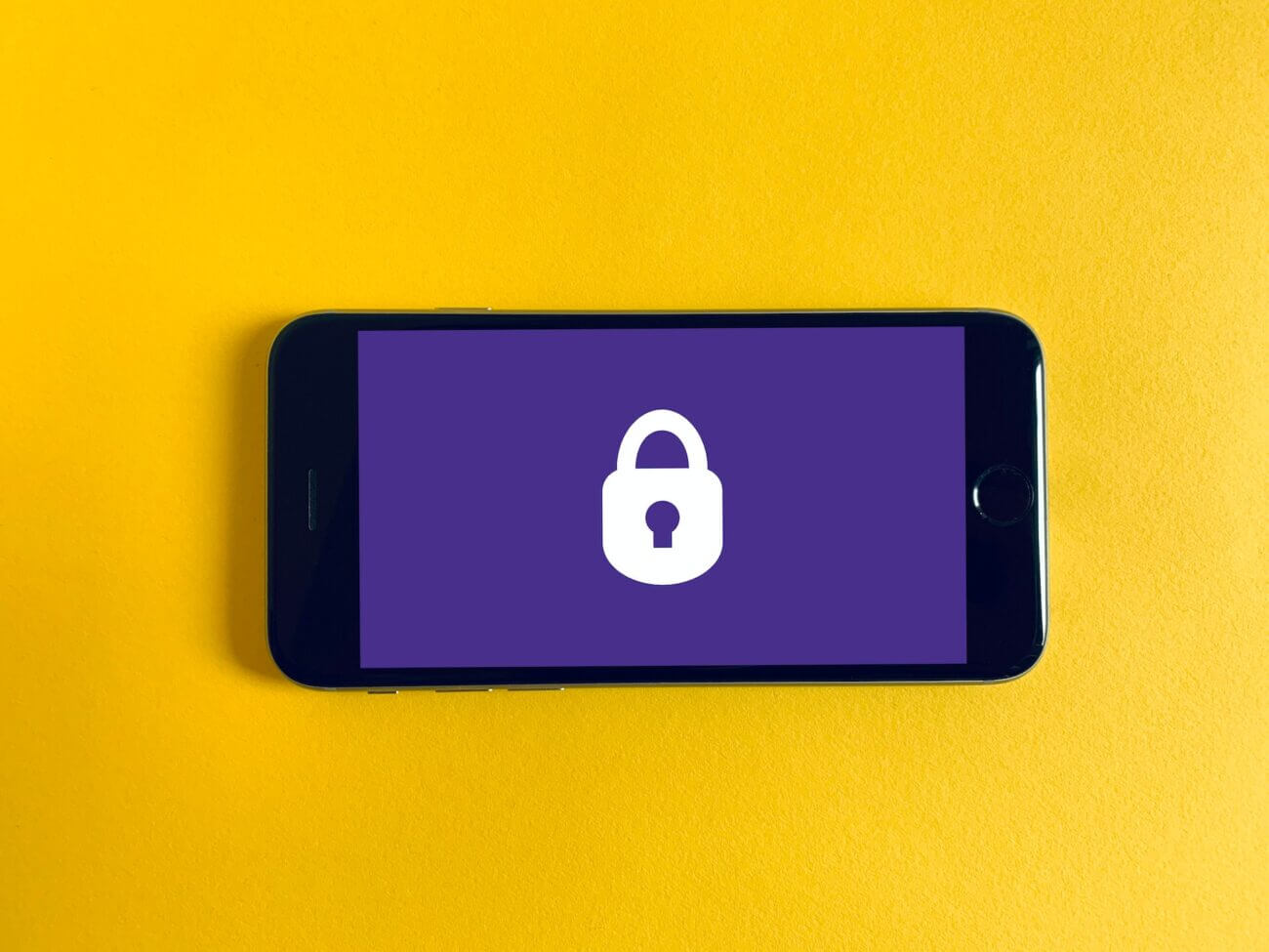 A horizontal smartphone displays a lock icon
