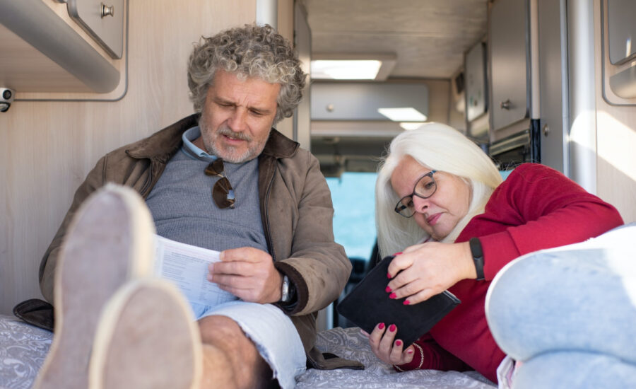 A middle-aged couple enjoy downtime in the park home they plan to sell in the U.S.