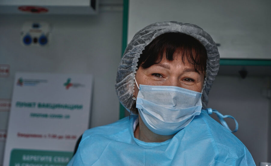 A 55-year-old nurse smiles as she contemplates her five or 10 year retirement plan.