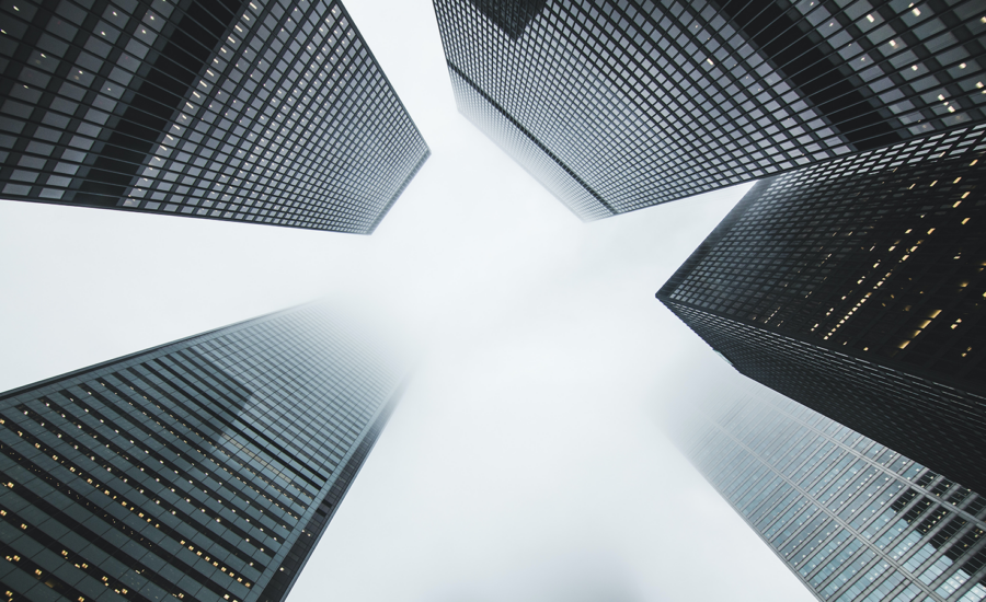 Buildings in the financial district, Bay Street in Toronto, are pictured from below.