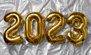 Balloons shaped like 2023 to signify this is about the investing trends to watch for in 2023