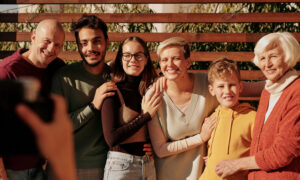 A multi-generational photo, showing the impact of a death in the family, estate planning and the final return