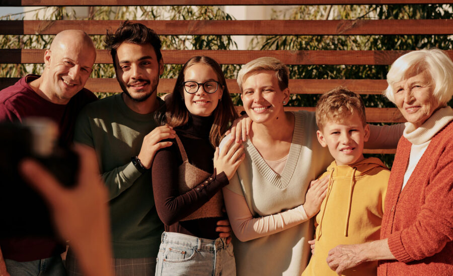 A multi-generational photo, showing the impact of a death in the family, estate planning and the final return