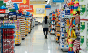 A woman walks along the grocery store aisles, as we discuss inflation, including on groceries.