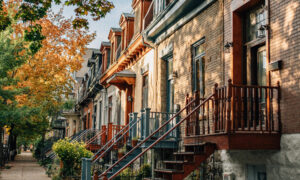 A row of Montreal townhomes in autumn