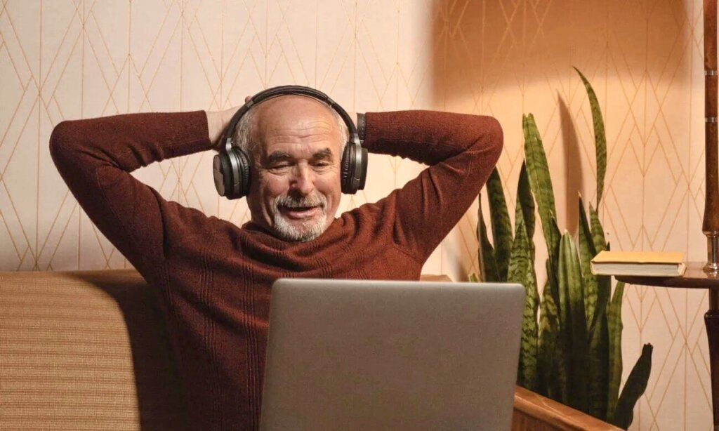 A man looking relaxed and happy with the Best fixed income ETFs.