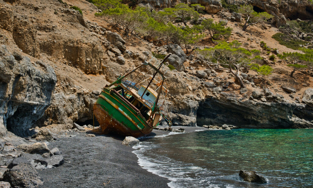 For the desert-island ETF picks, this shows a shipwreck on a shoreline.
