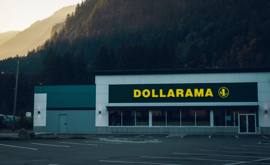 A Dollarama store and a Canadian mountainous landscape